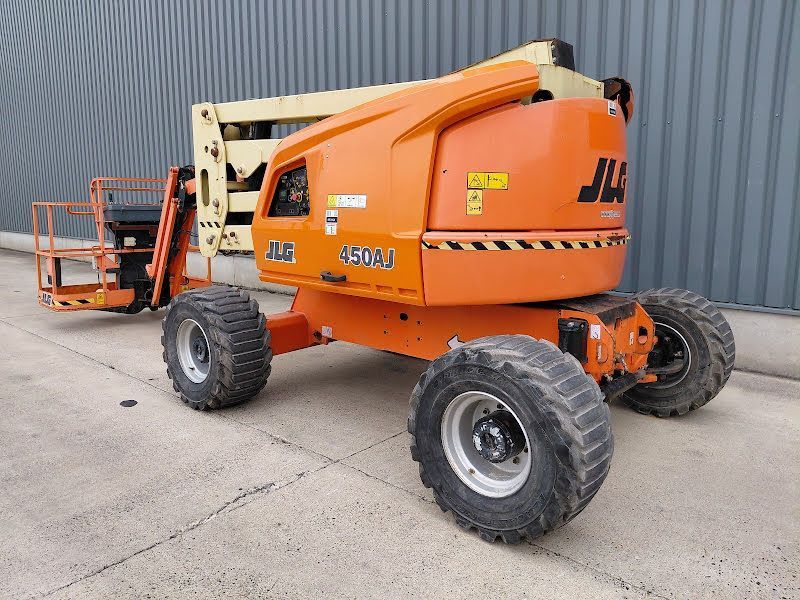 Ножничный вседорожный дизельный подъемник JLG 450AJ